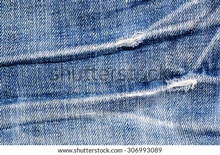 Vintage Dark Old Denim Fabric - Ripped Jeans Pale Soft Blue Color Texture Background