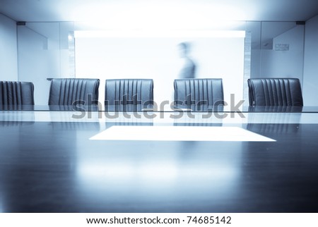 man move in Meeting room