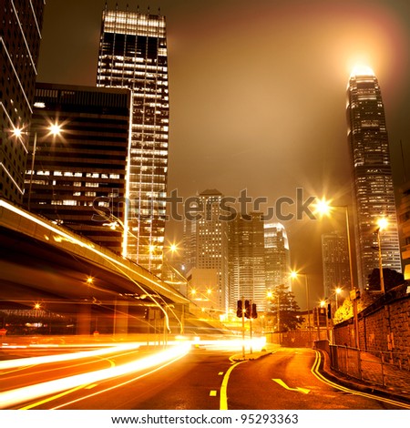 moving car with blur light through city at night
