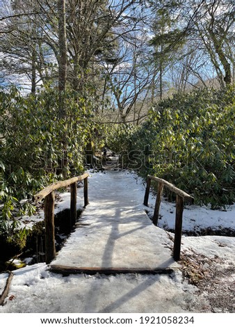 Similar – Image, Stock Photo Snowy hiking trail with legs