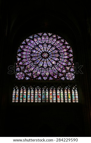 Notre Dame Cathedral, Paris, France. Paris tourist attraction. The North Rose stained-glass window of Notre Dame on June, 2007 in Paris, France.