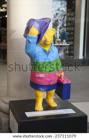 LONDON - NOVEMBER 4. A decorated street model of Michael Bond\'s fictional character Paddington Bear, on November 4, 2014, for later charity auction; one of 50 designs located across London.