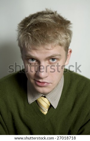 closeup portrait of young handsome blond  man