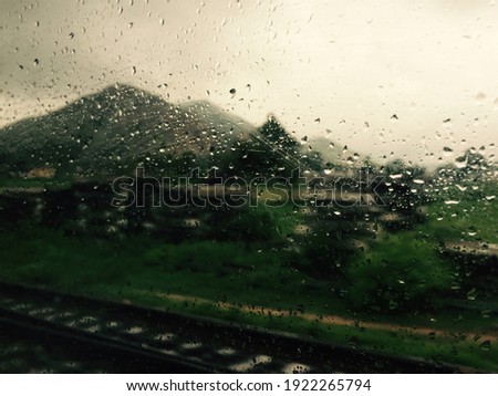 Similar – Image, Stock Photo Passenger perspective rainy weather in the right side mirror