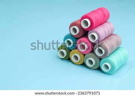 Similar – Image, Stock Photo Sewing threads in different colours in a box