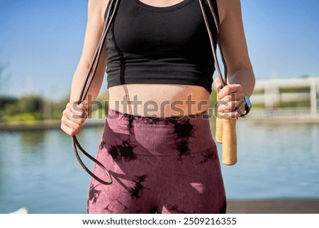 Similar – Image, Stock Photo Sportswoman jumping on terrace during training