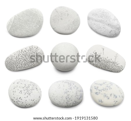 Pebble. Smooth gray sea stone isolated on white background with shadows Stock foto © 