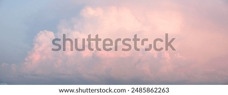 Similar – Foto Bild rosa blaue Abendstimmung am Strand am Meer mit geschlossenem Sonnenschirm und Lichtgirlande