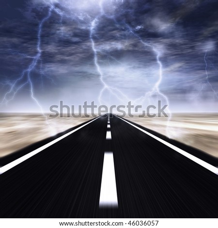 road with a thunder storm over it