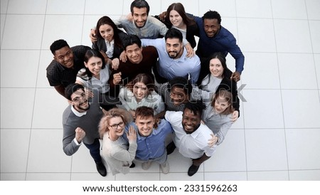 Similar – Image, Stock Photo Determined ethnic male entrepreneur walking on street