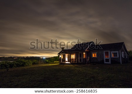 rustic cabin at night