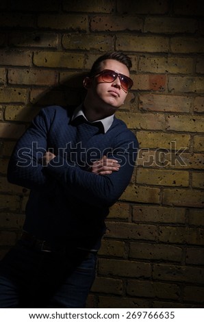 Attractive young male model in sunglasses