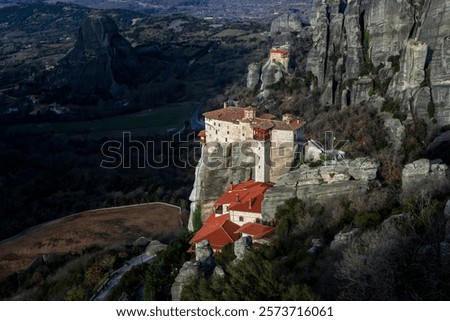 Similar – Foto Bild Kloster auf einem riesigen Felsen in Meteora, Griechenland mit Bergkette und dramatischen Wolken