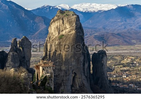 Similar – Foto Bild Kloster auf einem riesigen Felsen in Meteora, Griechenland mit Bergkette und dramatischen Wolken