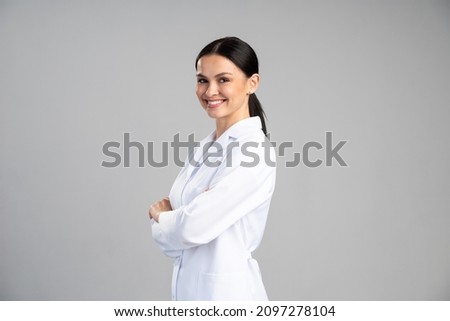 Similar – Image, Stock Photo medic woman in white coat and blue latex gloves holding a syringe, white studio background