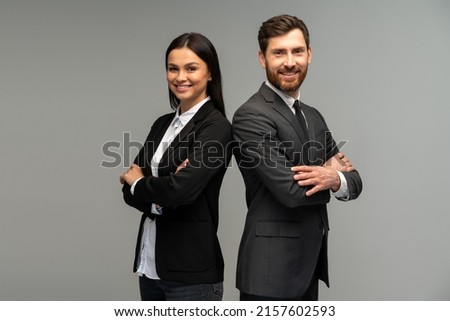 Similar – Image, Stock Photo Two girls stand back to back to each other. They are recognizable only as a shadow game, with blue evening sky.