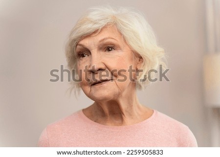 Similar – Image, Stock Photo Senior lady looking away from boardwalk