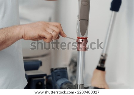 Similar – Image, Stock Photo Crop worker assembling mechanism in workshop
