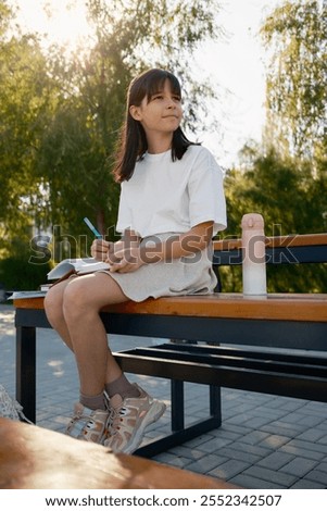 Image, Stock Photo Peaceful child daydreaming while lying on horse