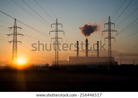 Power plant in the morning with the sun rising