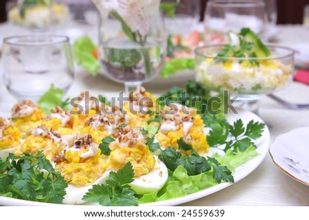 stuffed eggs with greens and nuts