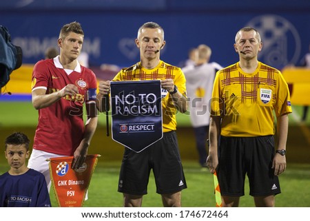 ZAGREB, CROATIA - OCTOBER 24, 2013: UEFA Europa league, group stage - GNK Dinamo Zagreb VS PSV Eindhoven. Referee holding No to racism flag.