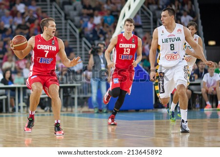 ZAGREB, CROATIA - AUGUST 26, 2014: Friendly basketball game - Croatia vs Lithuania. Bojan BOGDANOVIC (7), Mario HEZONJA (13) and Jonas MACIULIS (8).