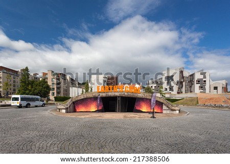 EDINBURGH, SCOTLAND: AUGUST 4, 2014: Earth\'s core gallery dome in front of Our Dynamic Earth, Edinburgh 5 star attractions.
