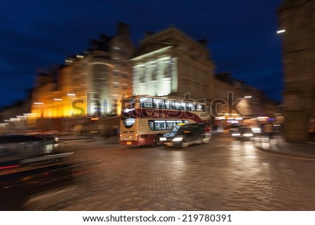 EDINBURGH, SCOTLAND: AUGUST 3, 2014: Night shot of Lothian doubledecker bus.