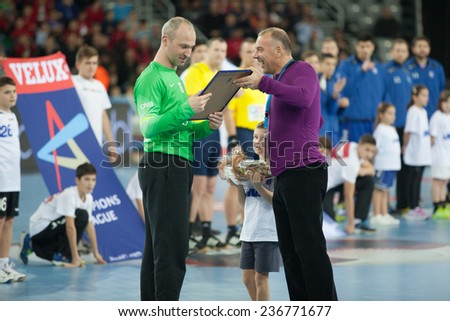 ZAGREB, CROATIA - DECEMBER 9, 2014: EHF Men\'s Champions League, match between HC Zagreb and HC Paris Saint-Germain. OMEYER Thierry receiving acknowledgement before the match.