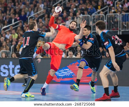 ZAGREB, CROATIA - APRIL 9, 2015: EHF Men\'s Champions League - Quarter final match between HC Zagreb PPD and HC Barcelona. KARABATIC Nikola (33) shooting at goal.
