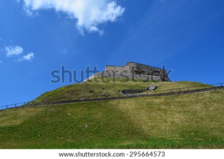 Old stone fortress in the open air in the city of Vilnius\
on the background of blue sky