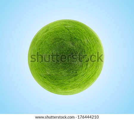 Green grass sphere on a blue clear background