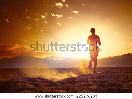 Similar – Image, Stock Photo Sportsman jogging on sandy terrain in mountainous terrain