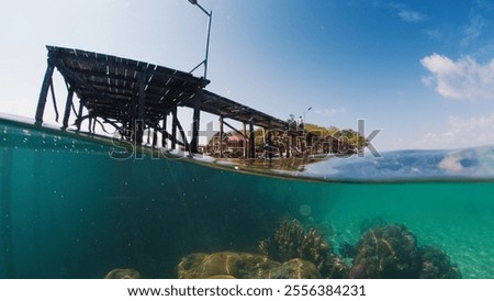 Similar – Image, Stock Photo Wooden pier on stilts on lake near mountains