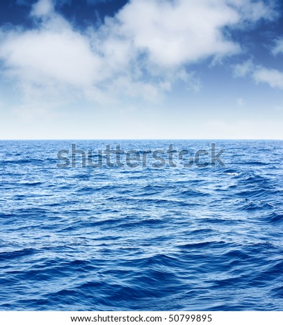 Blue sea and sky with clouds
