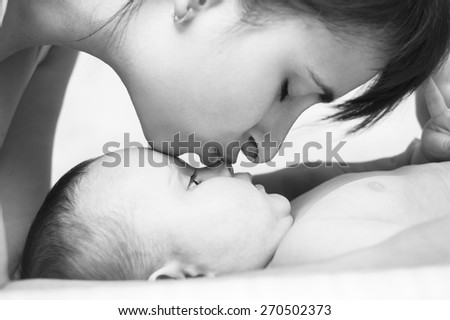 tenderness motherhood mother and baby mother kissing baby\'s nose