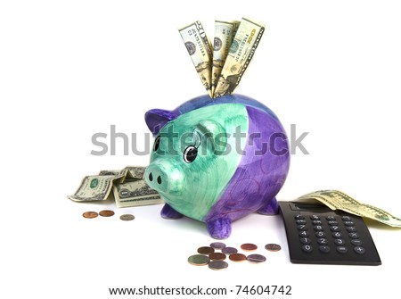 Piggy Bank, money and calculator concept of planning financially for future