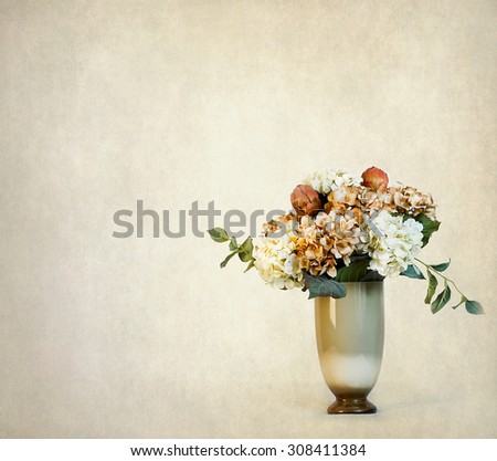 Floral flower arrangement with soft beige texture including cream and beige hydrangea\'s . . . a touch of vintage.