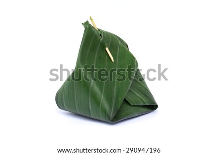 Sticky rice Thai custard is Thai dessert which wrap by banana leaf, within banana leaf is contain Sticky rice Thai custard