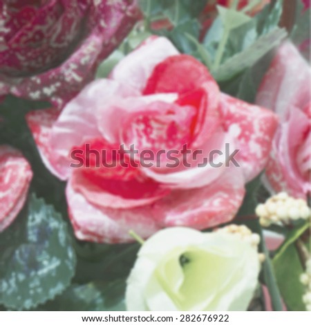 Fake flowers or artificial flowers blur style for background