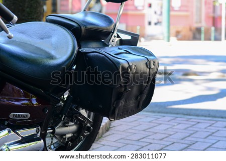 Szeged, Hungary - May 30th, 2015: Photo shoot of Yamaha Drag Star 1100 XVS bike from 2002, closeup shoot of seat and saddlebags. 4-stroke SOHC V-twin engine, 1063cc.