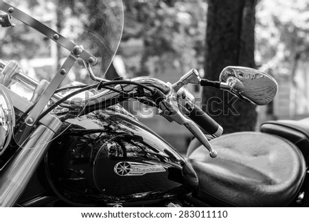 Szeged, Hungary - May 30th, 2015: Photo shoot of Yamaha Drag Star 1100 XVS bike from 2002, closeup shoot of  handle,brake and mirror. 4-stroke SOHC V-twin engine, 1063cc. Black and white photo.
