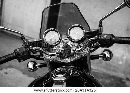 Subotica, Serbia - Jun 1st, 2015: Photo shoot of Kawasaki ZR 1100 Zephyr A1 bike from 1992, close up shoot of instrument panel, steering wheel and start key. Four stroke transverse four cylinder.