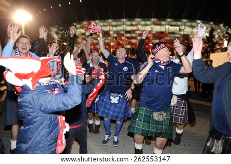 WARSAW, POLAND - OCTOBER 14, 2014: EURO 201 Football Cup Qualifiers Scotland vs Scotland\
o/p: polish and scotish football fans