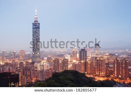 TAIPEI, TAIWAN - MARCH 11:  Taipei by night with Taipei 101 in March 11, 2014.Taipei 101  the the world\'s second tallest building. Night view of Taipei`s downtown.