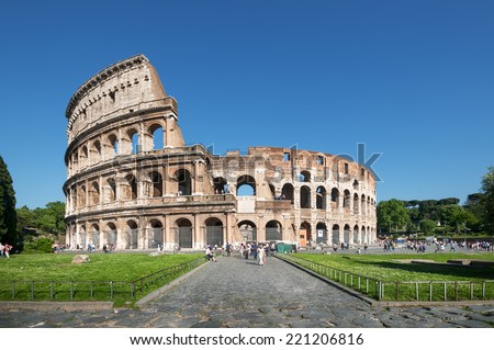ROME - ITALY, MAY 10, 2012: Tourists  visiting the Colosseum on may 10, 2012. The Colosseum is an iconic symbol of Imperial Rome. It is one of Rome\'s most popular tourist attractions in Rome.