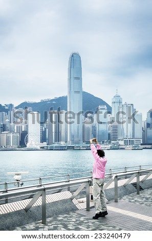 Morning gymnastic in Hong Kong,  with a view of Victoria Bay.