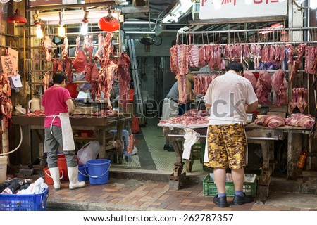 Hong Kong, Hong Kong SAR -November 12, 2014:  Bowrington Road Market in Hong Kong. Butcher\'s shop in Hong Kong,  Bowrington Road, Wanchai.
