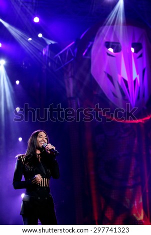 KIELCE, POLAND - JUNE 27: Austrian cross-dressing diva Conchita Wurst  sings at a concert in Kiellce, Poland on Saturday June 27 , 2015 on February 12, 2015 in Sanremo, Italy.